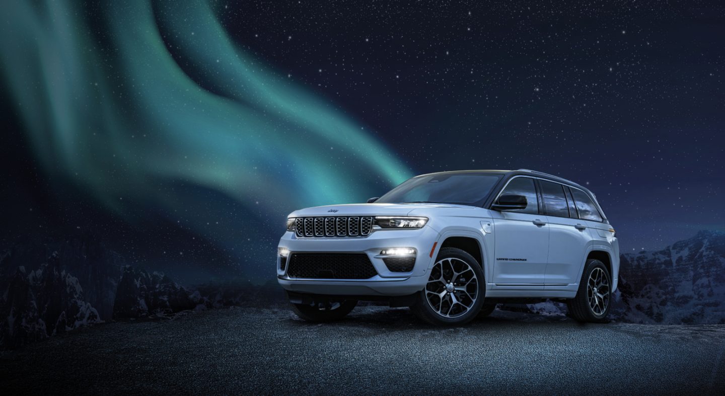 The 2023 Jeep Grand Cherokee Summit Reserve parked in a desert setting.